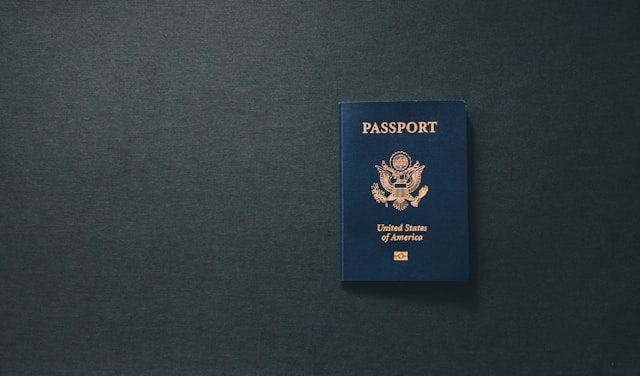 A U.S. passport on a dark-themed surface. 
