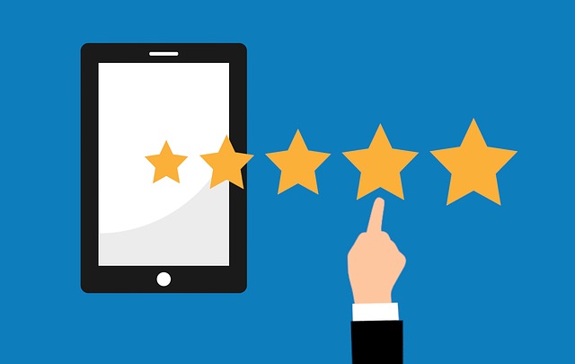 An illustration of a hand selecting five-star ratings from a digital tablet.
