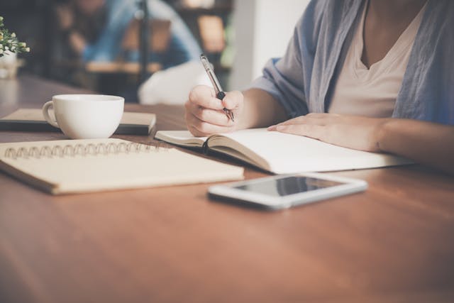 A professional translator works on a document from home.
